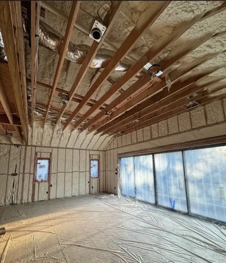 Interior walls and ceiling insulated with spray foam during new construction in Crown Point